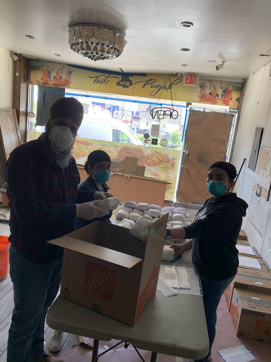 Safetech staff volunteering at a local community event