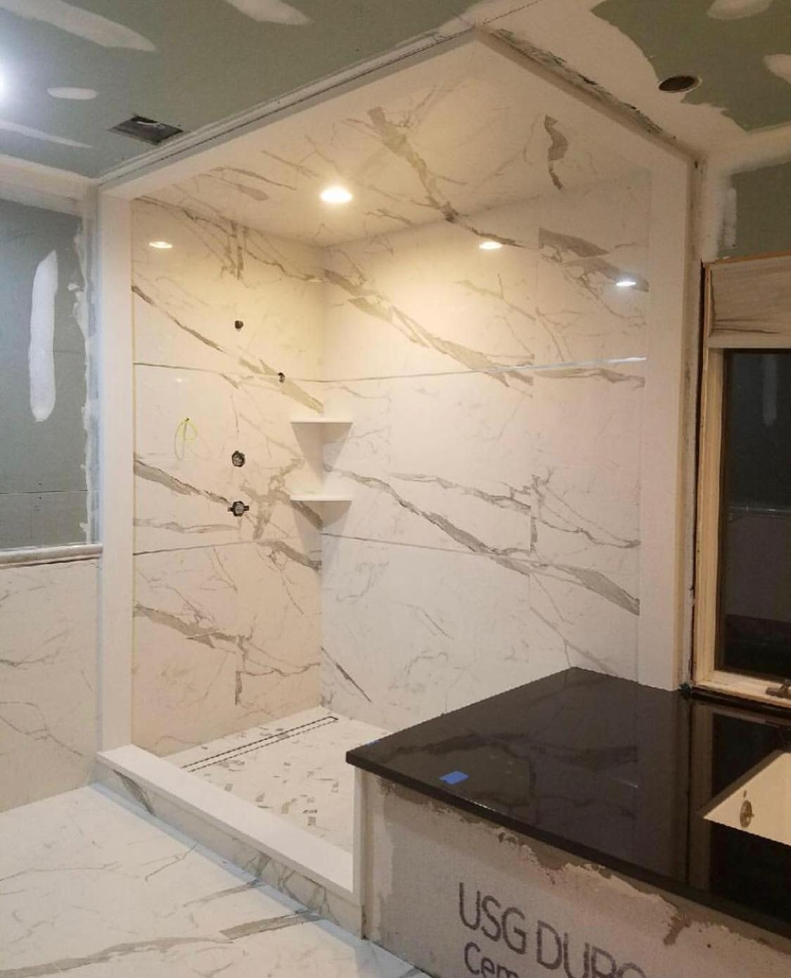 Marble bathroom shower installation in progress