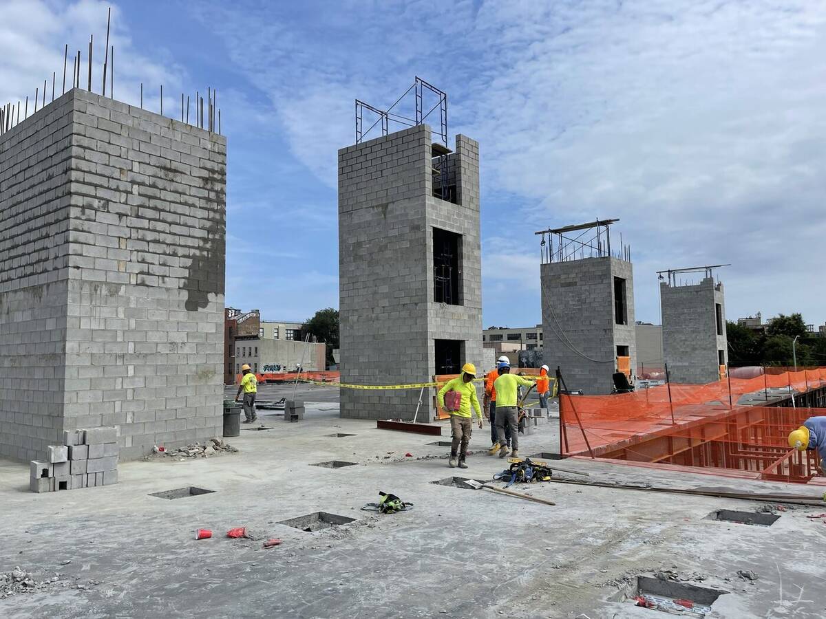 Crew working on a new building under construction